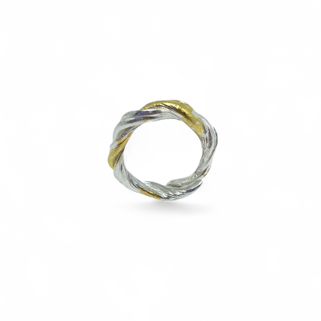 Twisted ring with gold leaf